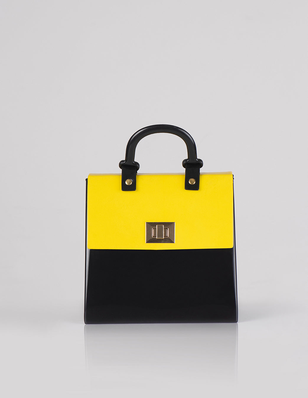 Bolso Cofre en Caucho Negro x Amarillo